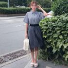 Set: Plaid Short-sleeve Blouse + Midi Skirt