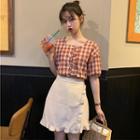 Plaid Short-sleeve Top / Ruffle Trim A-line Skirt