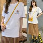 Embroidered Short-sleeve T-shirt / Striped Midi A-line Skirt