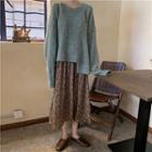 Long-sleeve Asymmetric Knit Top / High-waist Floral A-line Skirt