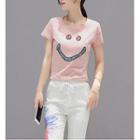 Set: Sequined Smiley Face Short-sleeve Top + Floral Print Capri Pants