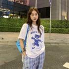 Elbow-sleeve Cartoon Print T-shirt / Plaid Wide-leg Pants