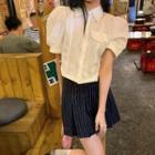 Puff-sleeve Plain Shirt / Striped Mini Pleated Skirt