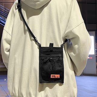 Applique Drawstring Mesh Panel Crossbody Bag