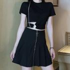 Cut-out Short-sleeve Cropped T-shirt / Pleated Mini A-line Skirt / Set