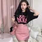 Short-sleeve Lettering T-shirt / Patent A-line Skirt