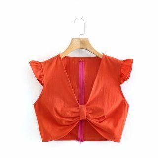 Sleeveless Cutout Bow Blouse