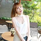 Deep V-neck Sleeveless Top With Sash