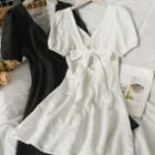 Embossed Ribbon-back Ruched Midi Dress