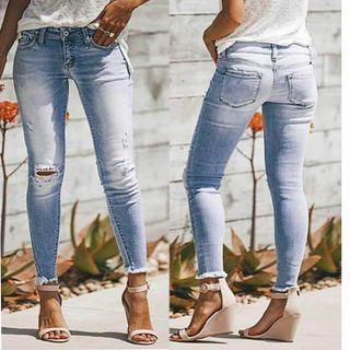 Low-rise Skinny-fit Ripped Jeans