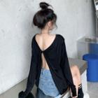 Long Sleeve Round Neck Twisted Open Back Top