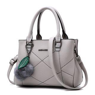 Faux Leather Tote With Pompom Charm