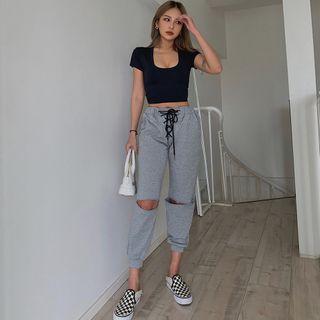 Cutout-knee Lace-up Jogger Pants