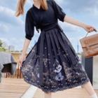 Set: Short-sleeve Cut-out Blouse + Cat Print Midi A-line Skirt