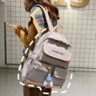 Doll Charm Letter Embroidered Nylon Backpack