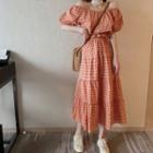 Set: Plaid Off-shoulder Puff-sleeve Top + Tiered Midi A-line Skirt