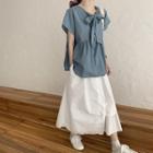 Bow Back Short-sleeve Blouse / Irregular Hem Midi A-line Skirt