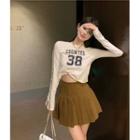 Long-sleeve Lettering T-shirt / Pleated A-line Skirt