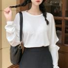 Long-sleeve Cutout T-shirt / Asymmetric Midi A-line Skirt