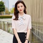 Short-sleeve Dotted Tie-neck Blouse