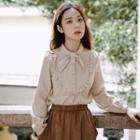 Tie-neck Ruffle Long-sleeve Blouse Almond - One Size