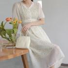 Set: Short-sleeve Lace Trim Dress + Spaghetti Strap Floral Print Dress