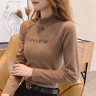 Long-sleeve Lettering Embroidered Mock-neck Top
