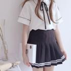 Tie-neck Short-sleeve Shirt / Pleated Mini A-line Skirt