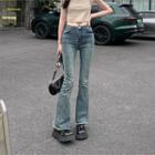 Low-rise Frayed Bootcut Jeans