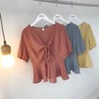 Plaid Short-sleeve V-neck Peplum Top