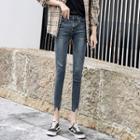 Ripped Asymmetric Cropped Skinny Jeans