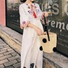 Tie-neck Tasseled Embroidered Midi Dress
