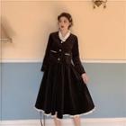 Faux Pearl Button Long-sleeve Top / A-line Midi Skirt
