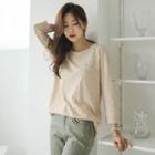 Diagonal-buttoned M Lange T-shirt