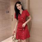 Short-sleeve Asymmetric Buttoned Polka Dot A-line Mini Dress