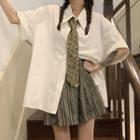 Short-sleeve Plain Shirt / High-waist Striped Skirt / Printed Tie
