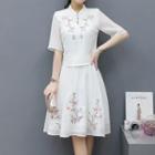 Set: Flower Embroidered Elbow-sleeve Top + A-line Skirt