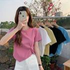 Short-sleeve Round Neck Asymmetrical Cropped T-shirt