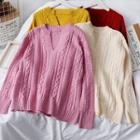 Loose-fit Cable-knit V-neck Sweater