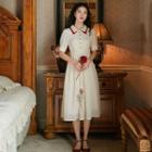 Collared Short-sleeve Flower Embroidered Midi A-line Dress
