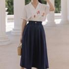 Set: Short-sleeve Floral Embroidered Shirt + Midi A-line Skirt
