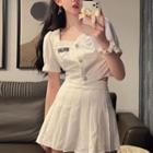 Puff-sleeve Blouse / Pleated A-line Skirt