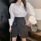 High-waist Asymmetric Buttoned Mini Skirt