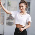 Letter Embroidered Open Back Short Sleeve Cropped Top