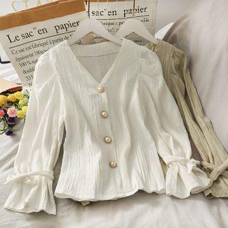Embossed V-neck Blouse