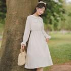 Long-sleeve Tie-neck Button-up A-line Dress