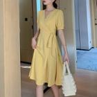 Puff-sleeve Tie-side A-line Wrap Dress