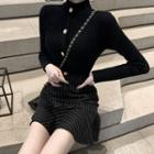 Buttoned Mock-neck Knit Top / Striped Mini Skirt
