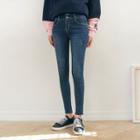 Button-front Distressed Skinny Jeans