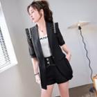 Puff-sleeve Ruffled Blazer / Rhinestone Shorts